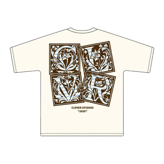 Espalda de playera crema con cuatro azulejos ornamentales C L V R en café y azul